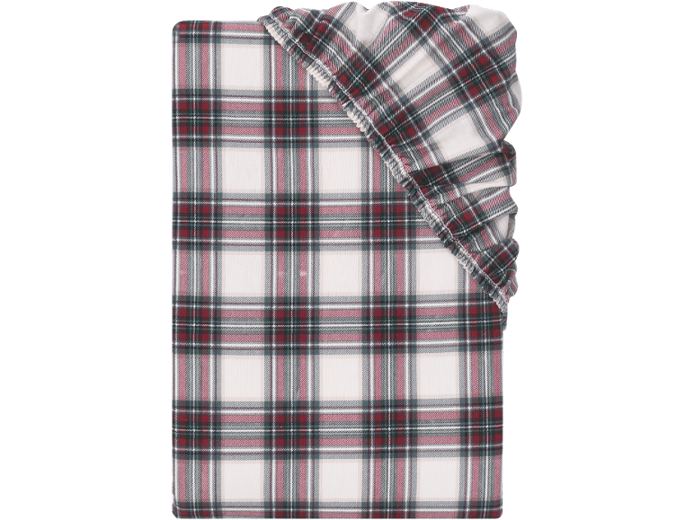Drap-housse à carreaux écossais rouges, verts et blancs.