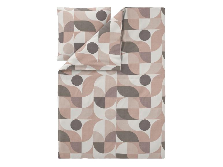 Parure de lit et taie d'oreiller à motif géométrique dans des tons rose, marron et blanc.