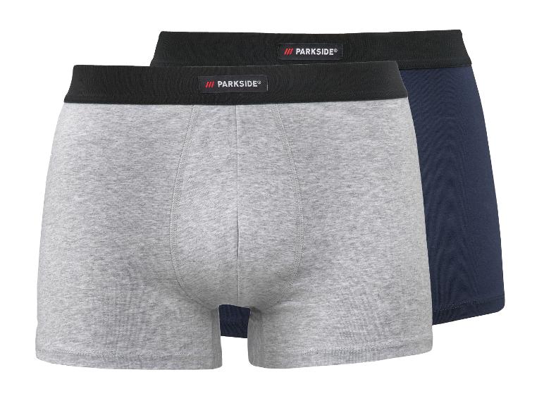 Deux boxers Parkside, un gris et un bleu marine, avec une ceinture élastique noire.