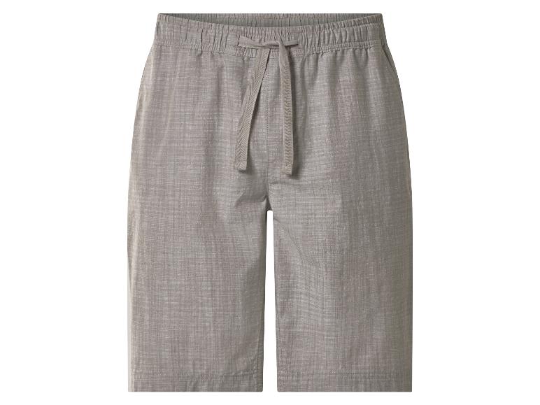 Short gris avec taille élastique et cordon de serrage.