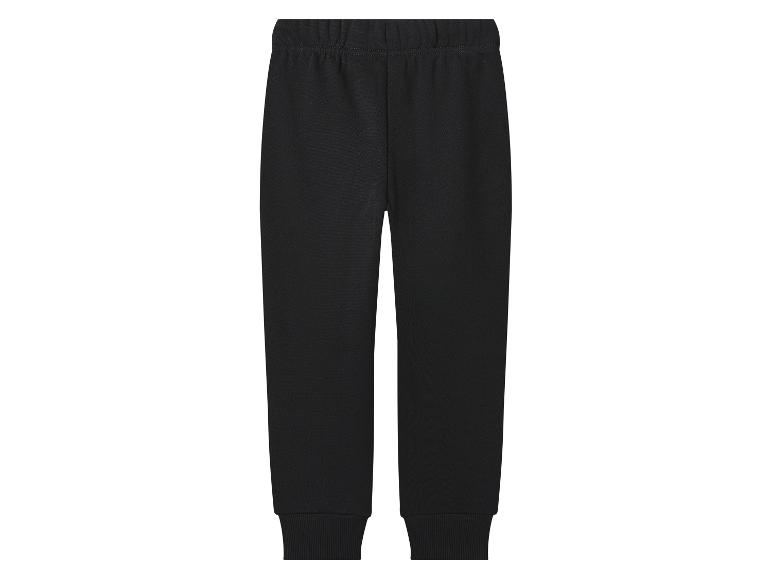 Pantalon de survêtement noir pour enfant avec taille élastique et poignets.