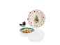 Service de table de Noël avec une assiette pleine de biscuits de Noël.