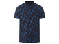 Un polo bleu marine à motif ananas.