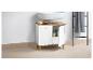 Une armoire de salle de bain blanche avec deux portes, un lavabo et un porte-serviettes.