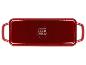 Plat de cuisson rectangulaire rouge avec poignées et pictogrammes sur le fond.