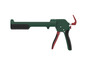 Un pistolet à calfeutrer vert avec une poignée rouge.