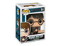 Figurine Pop! Harry Potter de Funko dans une boîte avec un balai.