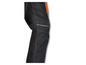 Pantalon de travail noir avec des détails orange.