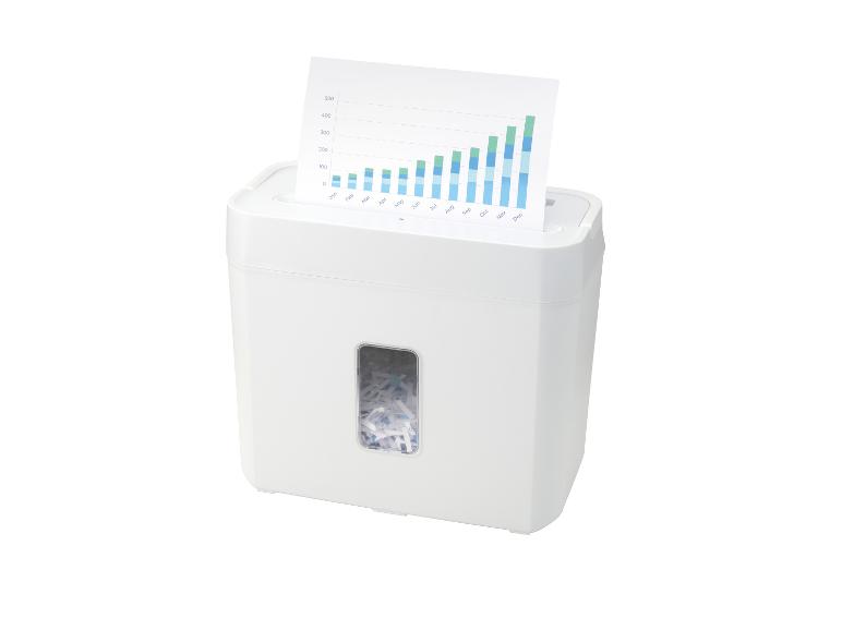 Destructeur de papier blanc avec un graphique inséré dans l'ouverture.