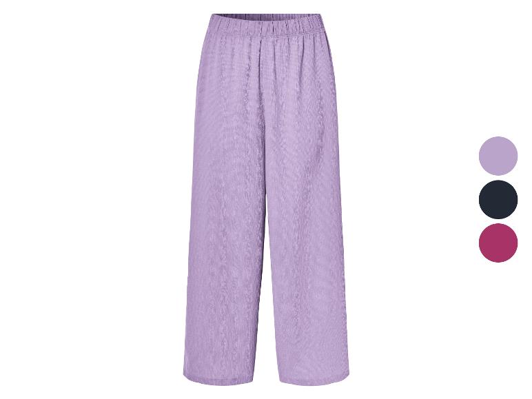 Pantalons amples lilas, disponibles en plusieurs couleurs.
