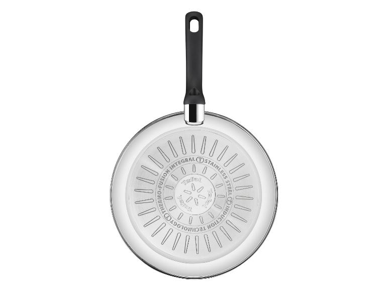 Fond de poêle en acier inoxydable avec technologie à induction et motif de répartition de la chaleur.