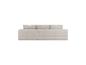 Canapé modulaire trois places beige avec coussins en velours côtelé.