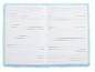 Carnet ligné à couverture en fausse fourrure bleue.