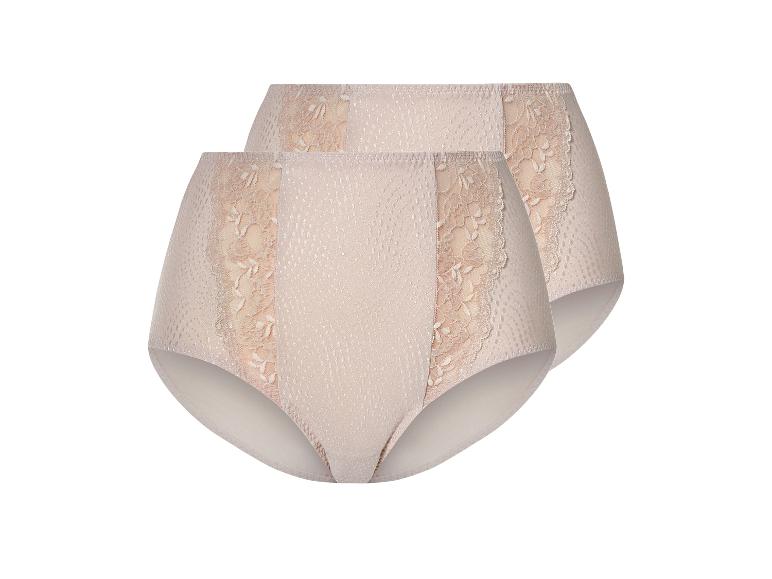 Deux paires de culottes beiges avec de la dentelle.
