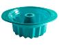 Un moule à gâteau en silicone turquoise Coox.