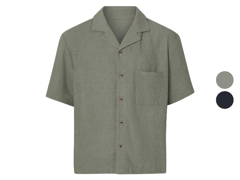Chemise à manches courtes, coupe décontractée, disponible en vert et noir.