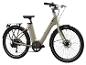 Un vélo électrique beige avec des pneus Schwalbe.