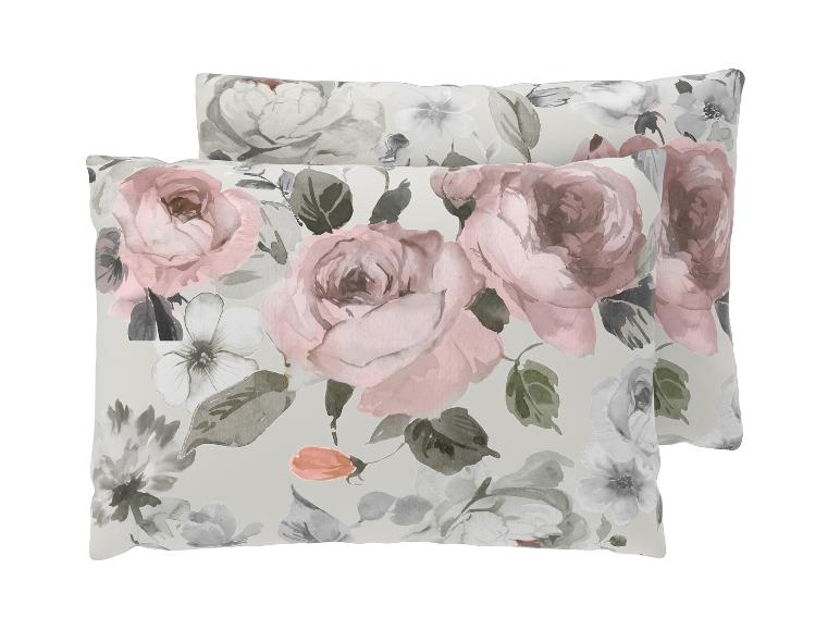 Coussins à motif floral de roses dans des tons roses et gris