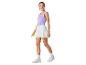 Tenue de sport : débardeur et jupe plissée blanche, tennis balls.