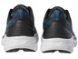 Des baskets Crivit noires et bleues avec une semelle blanche