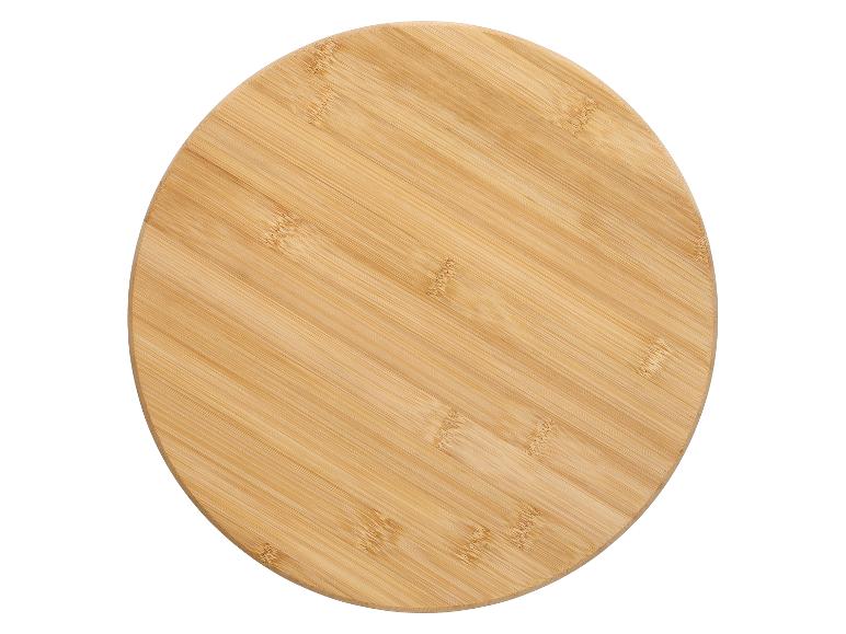 Planche ronde en bambou pour couper ou servir.