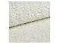 Tissu de tapis doux et moelleux de couleur blanc cassé avec un motif subtil.