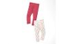Deux leggings : un rose et un avec un motif papillon.
