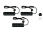 Trois multiprises noires avec interrupteur.