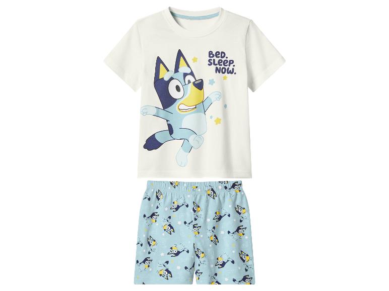 Pyjama enfant blanc et bleu avec personnages de dessins animés et texte 'BED. SLEEP. NOW.'