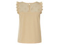 Top beige sans manches avec détails en dentelle.