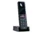 Téléphone sans fil noir avec base de chargement et clavier numérique.