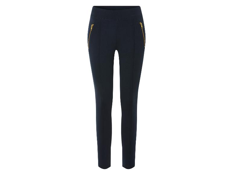 Pantalon bleu marine avec des fermetures éclair dorées.