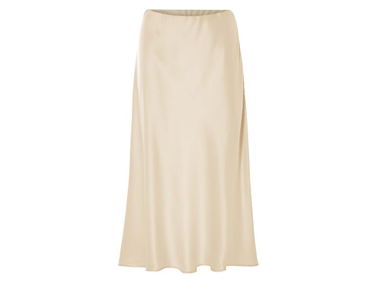 Une jupe en satin beige.