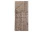 Couverture matelassée beige avec un motif à carreaux