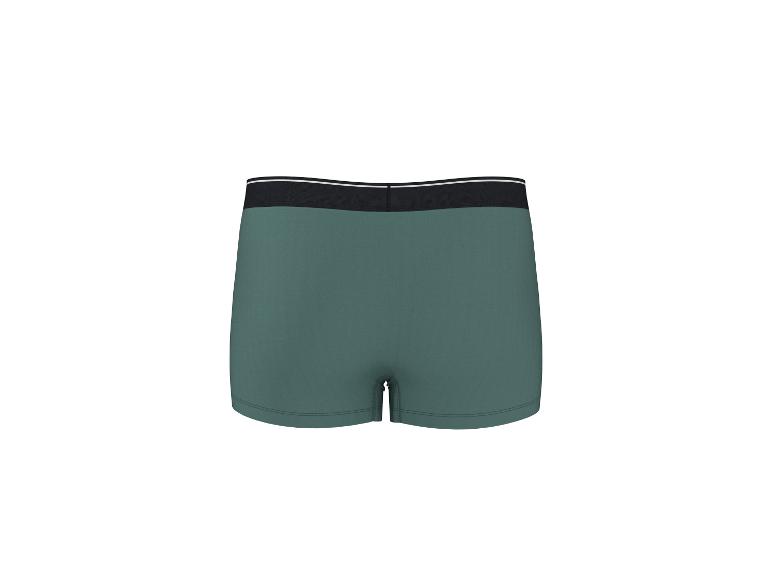 Caleçon boxer vert avec ceinture élastique noire et rayures blanches.
