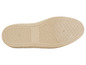 La semelle d'une espadrille beige avec un motif en losanges.