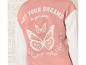Un sweat-shirt rose avec des papillons blancs et la phrase 'Let your dreams be your wings'.