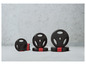 Disques de poids noirs Crivit, 1,25 kg, 2,5 kg et 5 kg.