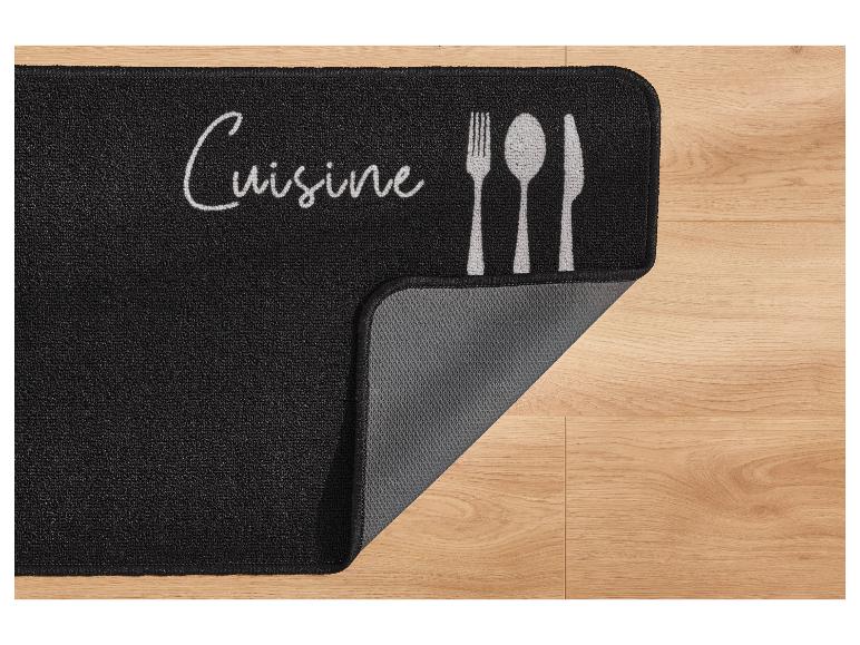Tapis de cuisine noir avec le texte 'Cuisine' et des couverts.
