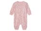 Combinaison bébé rose à pressions, motif animaux et étoiles.