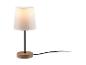 Une petite lampe de table noire avec un abat-jour blanc et un pied en bois.