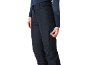 Pantalon de ski noir avec une fermeture éclair latérale, porté par une personne.