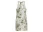Une robe blanche à imprimé tropical vert.