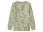 Haut à manches longues vert clair avec un motif de visages souriants vert foncé.