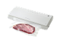 Machine sous vide avec bœuf cru emballé sous vide.