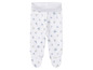 Pantalon blanc pour bébé avec un motif d'ancres et de bateaux