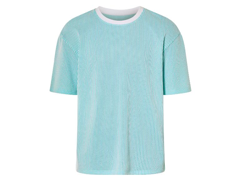 T-shirt turquoise à rayures blanches, coupe ample.