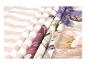 Tissus : rayé, violet et à motifs floraux