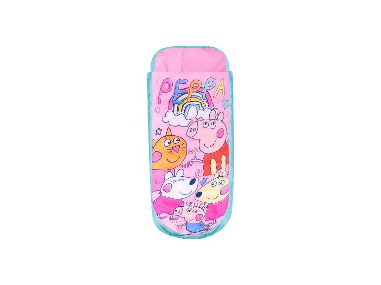 Sac de couchage rose avec des personnages d'animaux de dessin animé et un arc-en-ciel