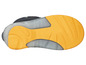La semelle d'une botte de pluie bleue avec des détails jaunes.